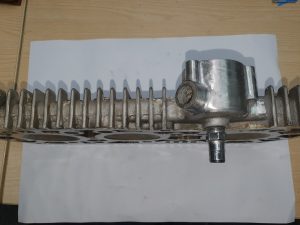 Cylinder head with slight corrosion visible