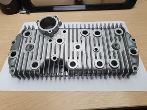 Vapour blasted cylinder head casting showing finished item